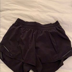 Black lululemon hotty hot tall shorts.